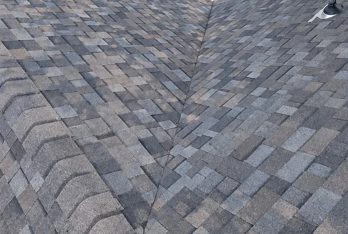 United Pro Construction contractor inspecting and repairing a roof